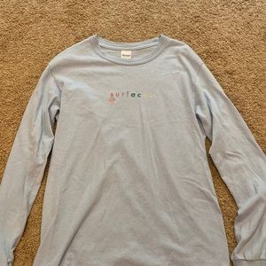 Surfaces band merch light blue long sleeve